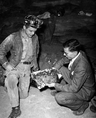 Bill Austin deep inside the flint ridge system dressing in suit for a publicity photo